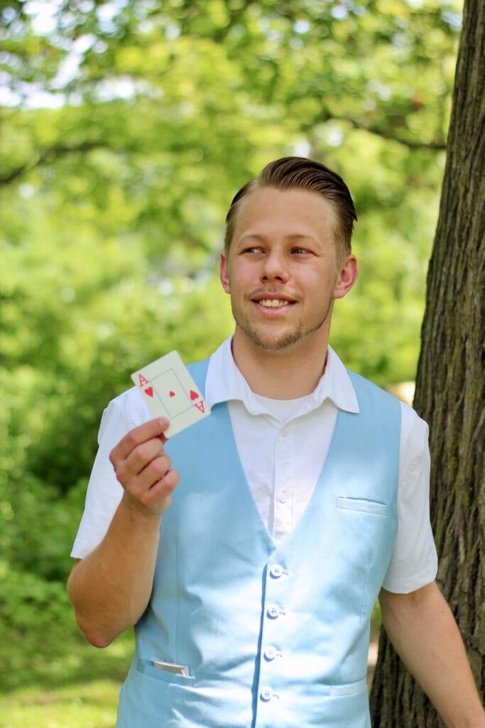 Ryan smiling with Ace of Hearts
